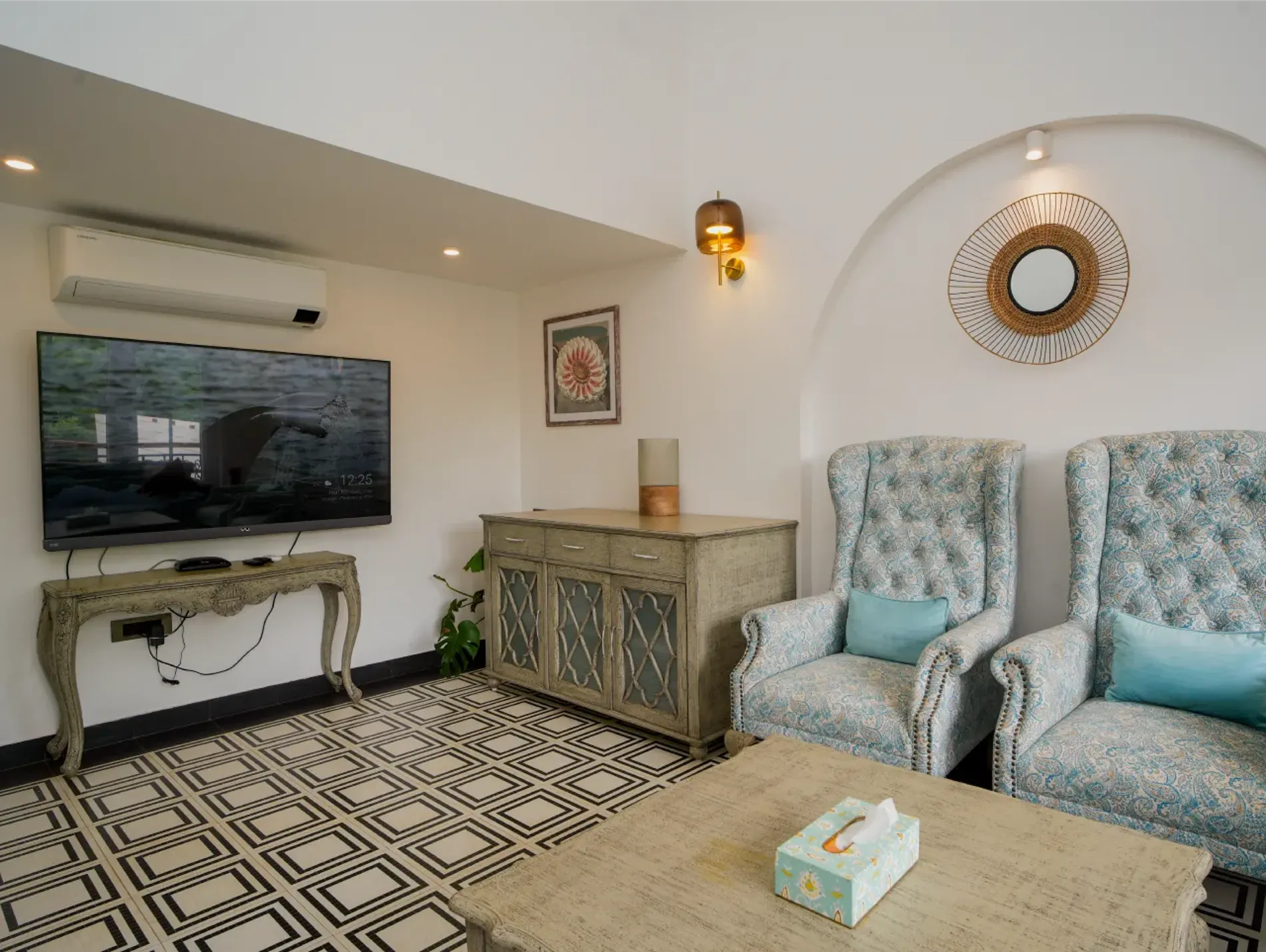 Entertainment lounge with a wall-mounted TV